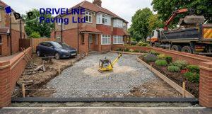 Driveway sub-base and drainage channel being installed in Loughton
