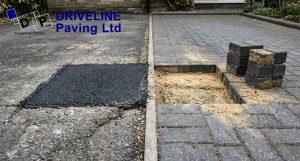 mismatched tarmac repair patch beside lifted block paving on a driveway