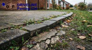 failed edge restraint on a block paved driveway