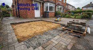 lifted section of block paving during a relay