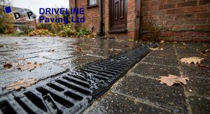 linear channel drain on a block paving driveway